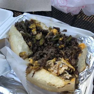 The "Dawson's Cure" tastes just as good as it looks.  The scrambled egg and cheddar cheese sauce really take the sandwich to the next level.