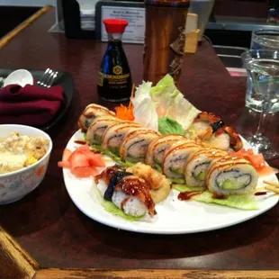Jenpachi roll, eel sushi, saki vodka martini and rice with lobster sauce.