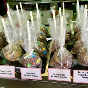 a display of chocolate covered lollipops