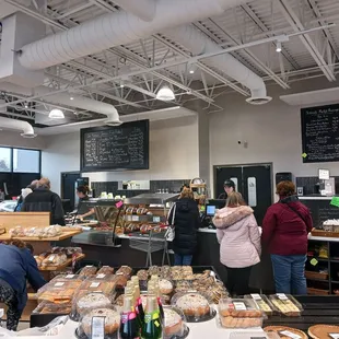Cashier and hot deli bar.  To the left is fresh bread display