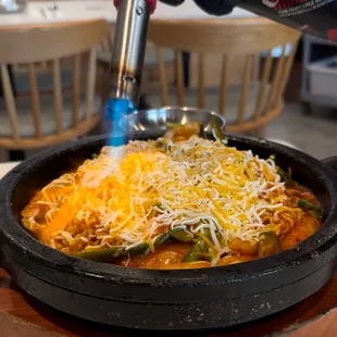 Cheese Rice Cake Deluxe (Being blowtorched)