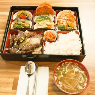 a bento box of food
