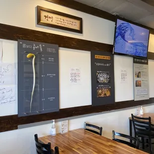 a restaurant with tables and chairs