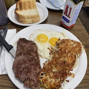6 oz. sirloin steak, hashbrowns, sunny side up eggs with buttered toast
