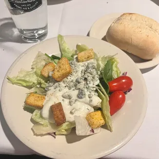 Side Salad with Blue Cheese Dressing/Crumbles and Side Roll.