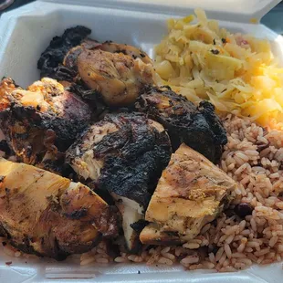 Large jerk chicken plate with cabbage and rice &amp; beans