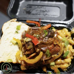 a meal in a styrofoam container