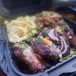 Jerk wings, spoiled cabbage, rice &amp; peas