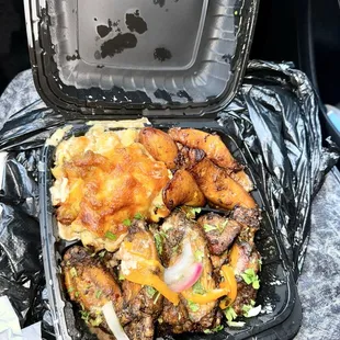 Wingz &amp; Tingz with grilled jerk wings, Ja&apos;mac and Cheese, and Plantains