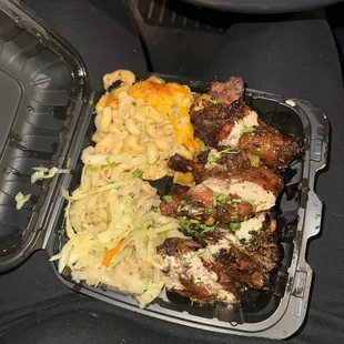 a meal in a styrofoam container