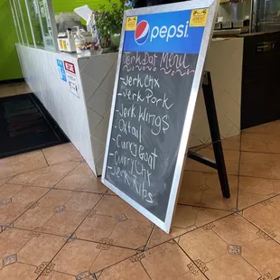 a sign in front of a restaurant