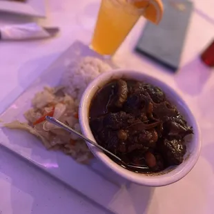 Oxtail Meal with extra meat and Passion fruit Rum Punch