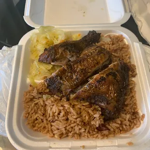 Jerk Chicken with rice and peas and cabbage