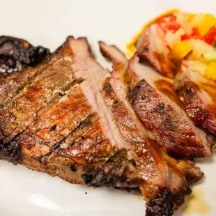 a plate of meat and vegetables