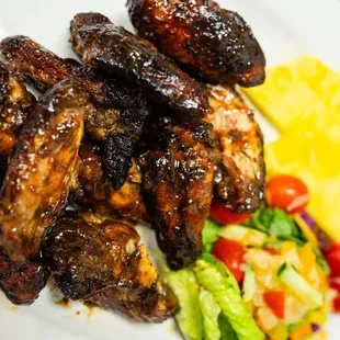 a plate of meat and vegetables