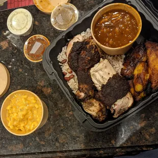 Jerk chicken quarters. Baked beans, plantains, Mac. All the sides were awesome. Sauces ok, chicken was fatty.