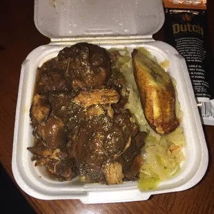 Brown stew chicken snack box.