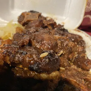 Salty, thin cut oxtails, don&apos;t order cake -its a sliver.