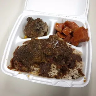 meat and rice in a styrofoam container