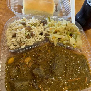 Curry Goat, cabbage, &amp; rice &amp; peas With coco bread