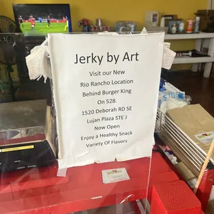 a sign in a store window