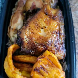 Jerk chicken with rice and peas