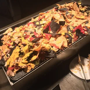 Nachos, cheese, chicken, jalapeños, salsa