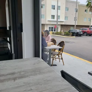 two people sitting at a table