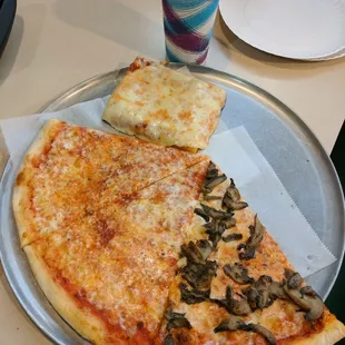 two slices of pizza and a drink