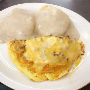 Cheddar omelette with chorizo, biscuit with gravy! Yum