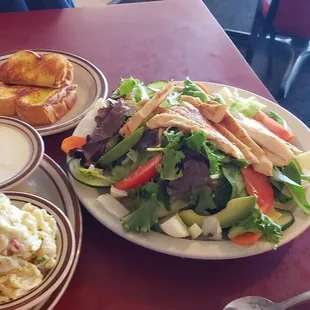 Highly recommend Jerry Bob&apos;s grilled chicken salad with potato salad, cold macaroni pasta salad, Texas toast, and choice of dressing.