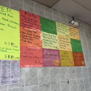 a variety of menus on a wall
