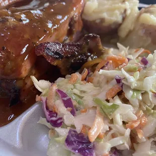 Bbq Ribs in sauce with Cole slaw and roasted red potatoes in butter