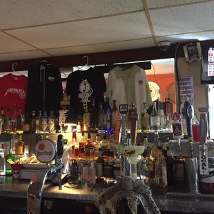 t - shirts hanging on the bar