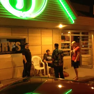 big neon J on the top of the hill