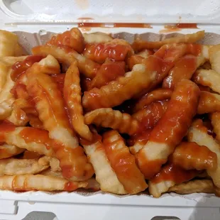 Fries w/ ketchup, mumbo sauce, salt, pepper