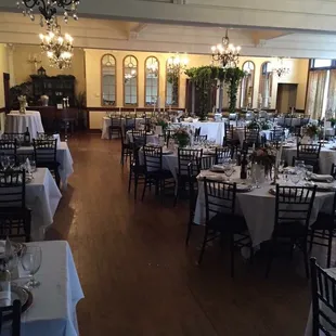 a dining room with tables and chairs