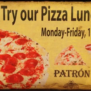 a sign for a pizza lunch buffet