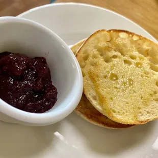 Homemade jam with a English muffin that came to the table already buttered.