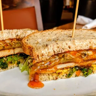 a cut in half sandwich on a plate