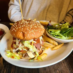 a burger and french fries on a plate
