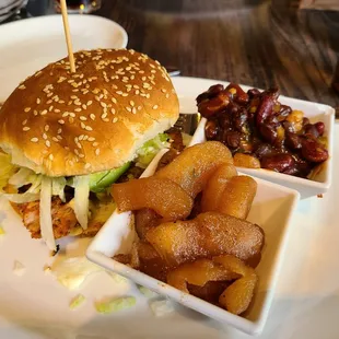 a hamburger and fries on a plate