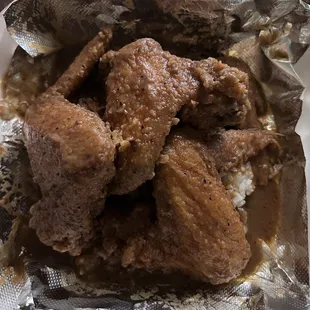 smothered wings with rice and gravy