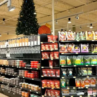 a grocery store with a christmas tree