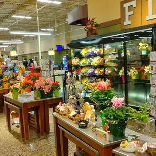 a grocery store filled with flowers