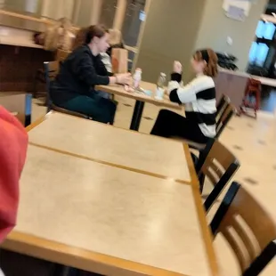 two people sitting at a table