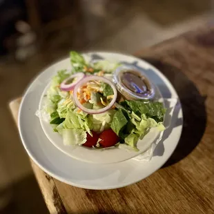 a salad on a white plate