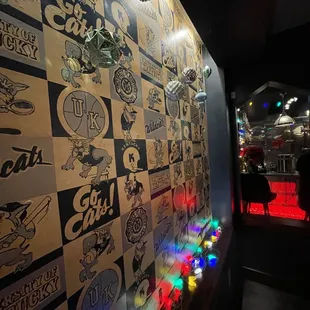 a wall covered in stickers