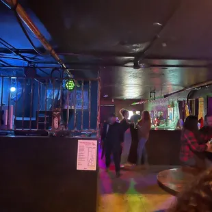 a group of people at a bar
