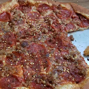 Large Pepperoni &amp; Sausage pizza. Love the way it's cut too.